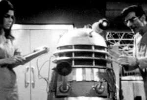 Scientists study the Daleks, unaware of the danger.